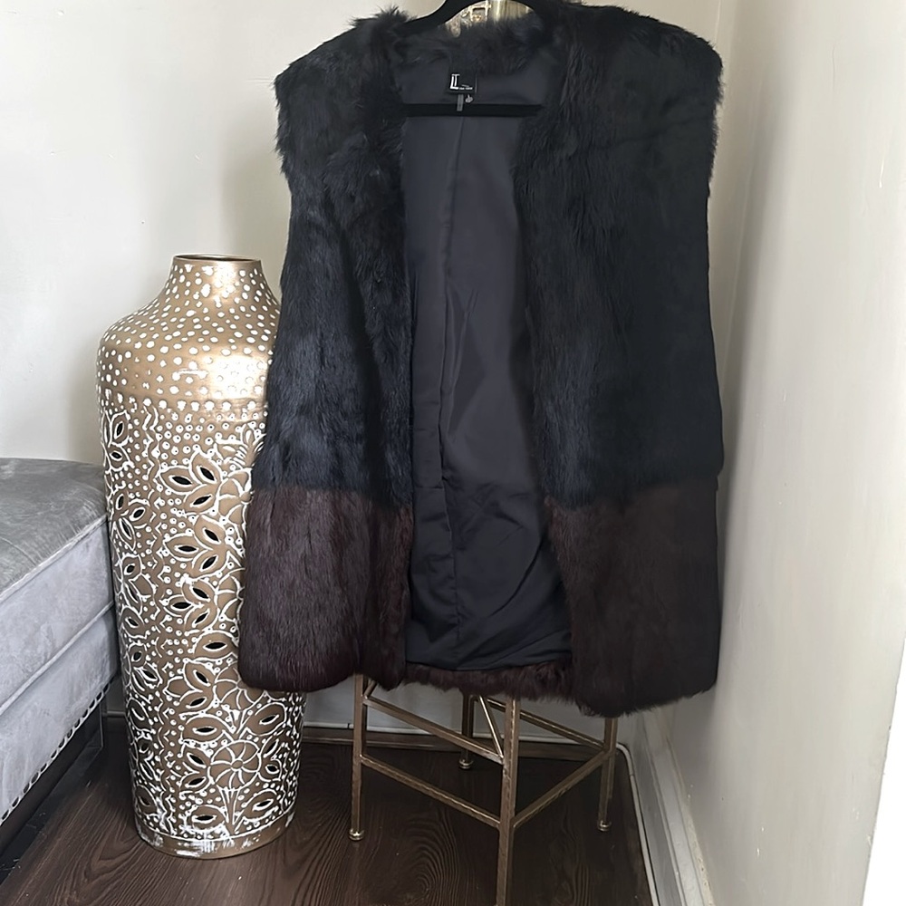 100% real fur vest, black and brown.